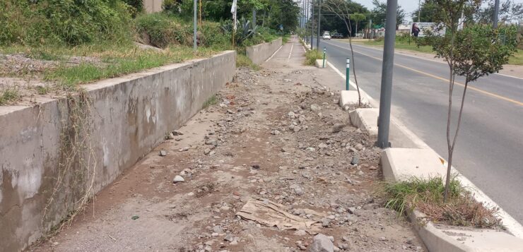 PHOTONOTE: Gravel and rocks continue to wash onto on the bicycle path