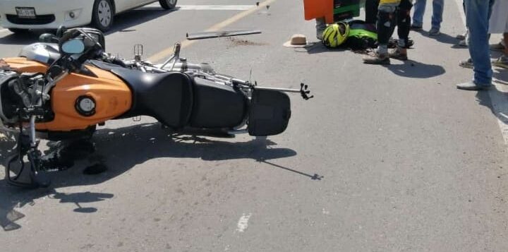 Motorcyclist collides with car at Walmart intersection