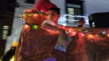 Ajijitecan families light up Christmas parade