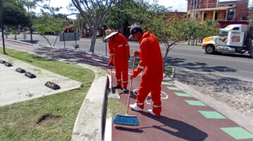 PHOTONOTE: Maintenance of the bicycle lane continues.