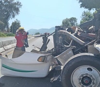 Trailer crashed into retaining wall and firetruck