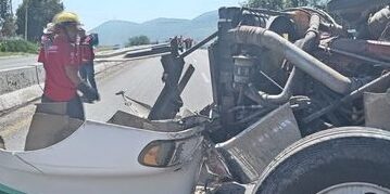 Trailer crashed into retaining wall and firetruck