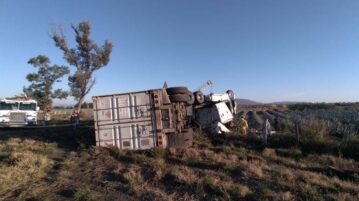 Family of three killed in tractor-trailer rollover