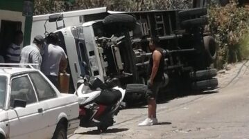 Another truck tips on uneven Jocotepec street